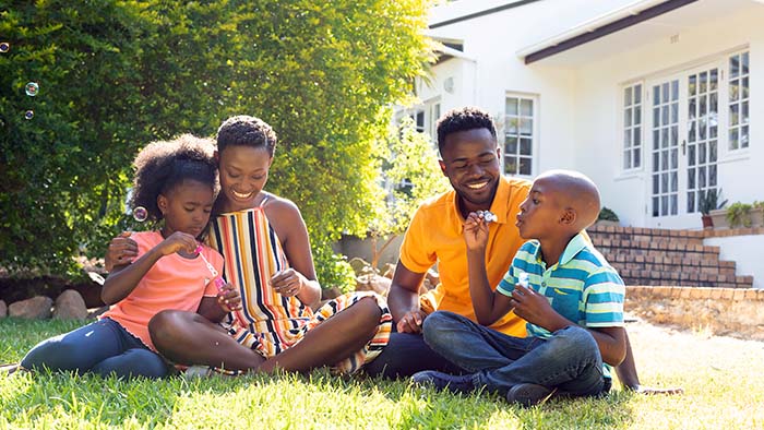 Family spending time together in their backyard